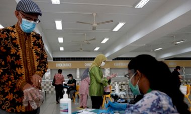 Singapur'da genel seçimler virüs gölgesinde yapılıyor