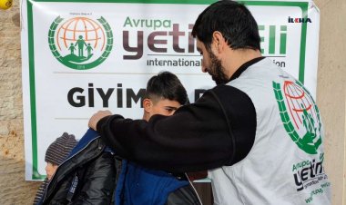 Avrupa Yetim Eli Erbil'de yüzlerce çocuğa kışlık giyim yardımında bulundu