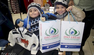 IHO-EBRAR ihtiyaç sahibi onlarca çocuğa giyim yardımında bulundu